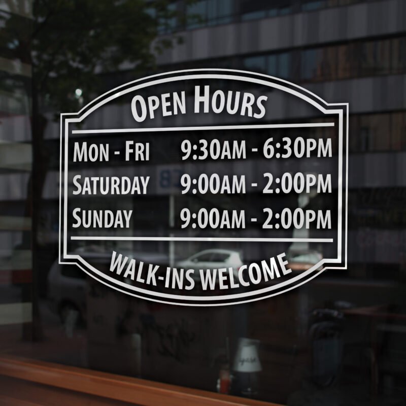 Custom open hour decal on glass door displaying business hours and contact information